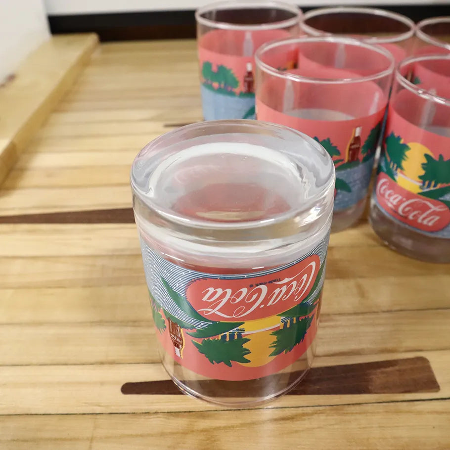 Summer time beach vibe coca cola glass bottom view