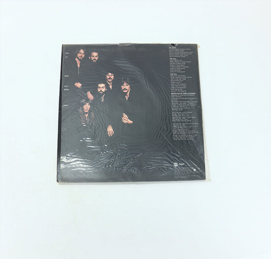 Vintage 12-in Vinyl Record Exile Mixed Emotions Warner Bros Print Back View