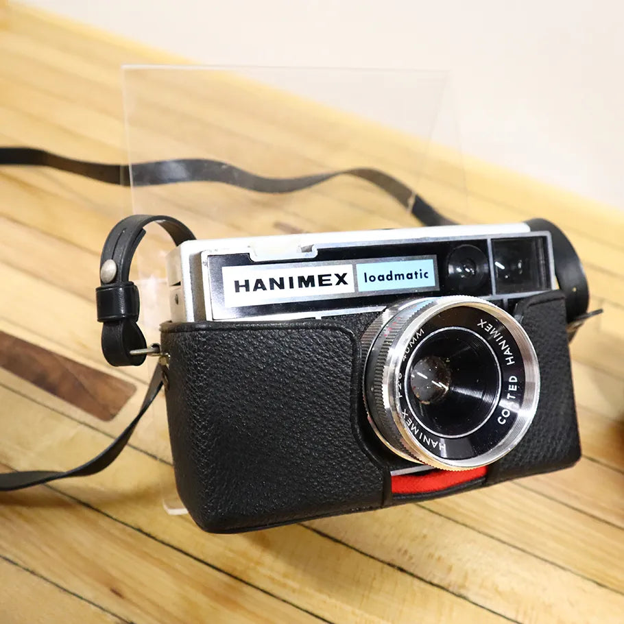 Vintage Hanimex C550 Loadmatic Black Silver Camera w/ Case 40mm Lens Rare ModelVintage Hanimex C550 Loadmatic Black Silver Camera w/ Case 40mm Lens Rare Model Close Up