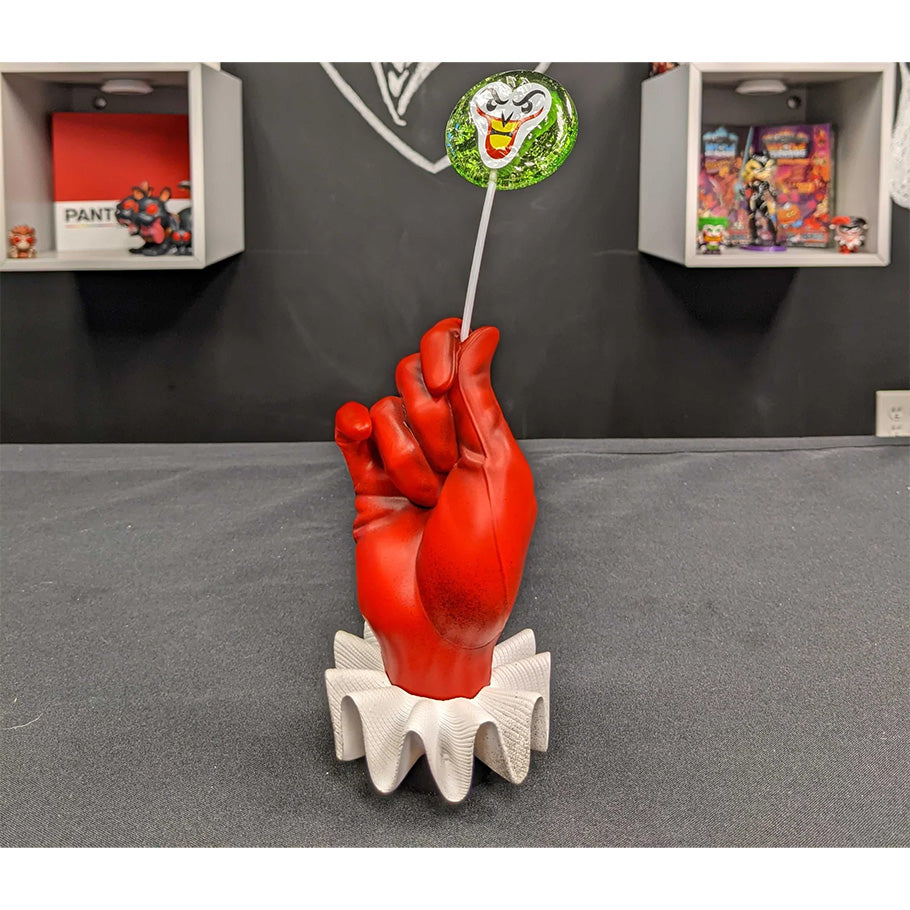Harley Quinn Puddin' Pop Life Sized Hand Painted Statue by Cryptozoic Displayed on a table